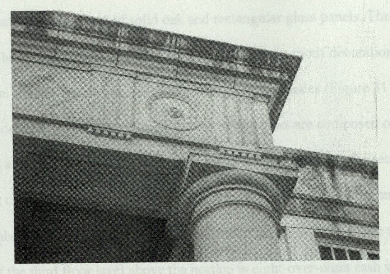 Portico entablature detail with diamond and bulls-eye motif